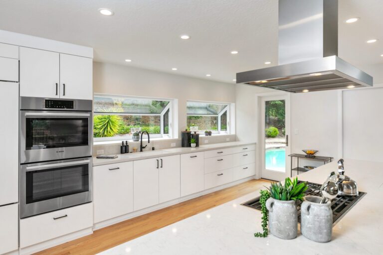white-kitchen-with-double-ovens-and-cooktop-2-scaled